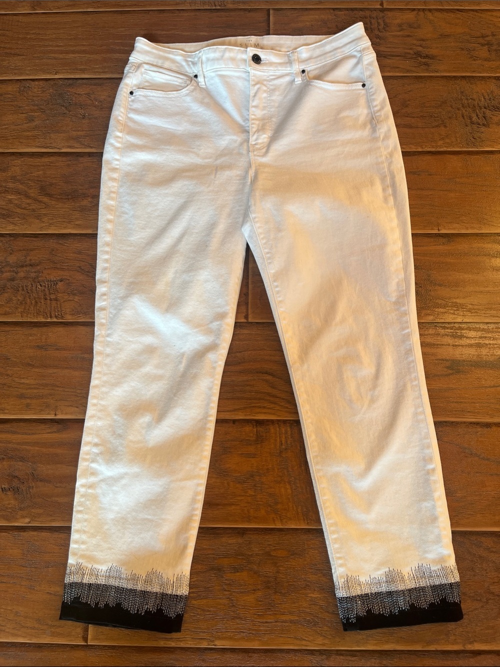 White House Black Market White Straight-Leg Jeans with Black Beaded Hem